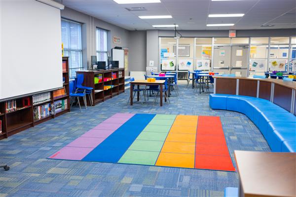 Empty Library with a rainbow rug